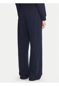 TOMMY HILFIGER - Tommy Hilfiger Spodnie dresowe UW0UW06081 Granatowy Wide Leg. Kolor: niebieski. Materiał: bawełna #4