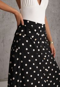 Renee - Czarna Wiskozowa Spódnica High Waist w Kropki z Guzikami Tadalion. Stan: podwyższony. Kolor: czarny. Materiał: wiskoza. Wzór: kropki. Styl: retro #4