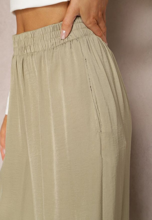 Renee - Zielone Letnie Spodnie o Szerokim Fasonie z Gumką w Talii Philomen. Kolor: zielony. Sezon: lato