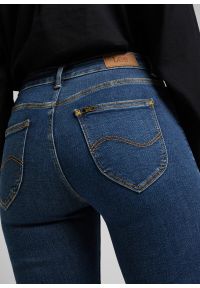 Lee - LEE DAMSKIE SPODNIE JEANSOWE LEE FOREVERFIT CLEAN RILEY L32SOVWD