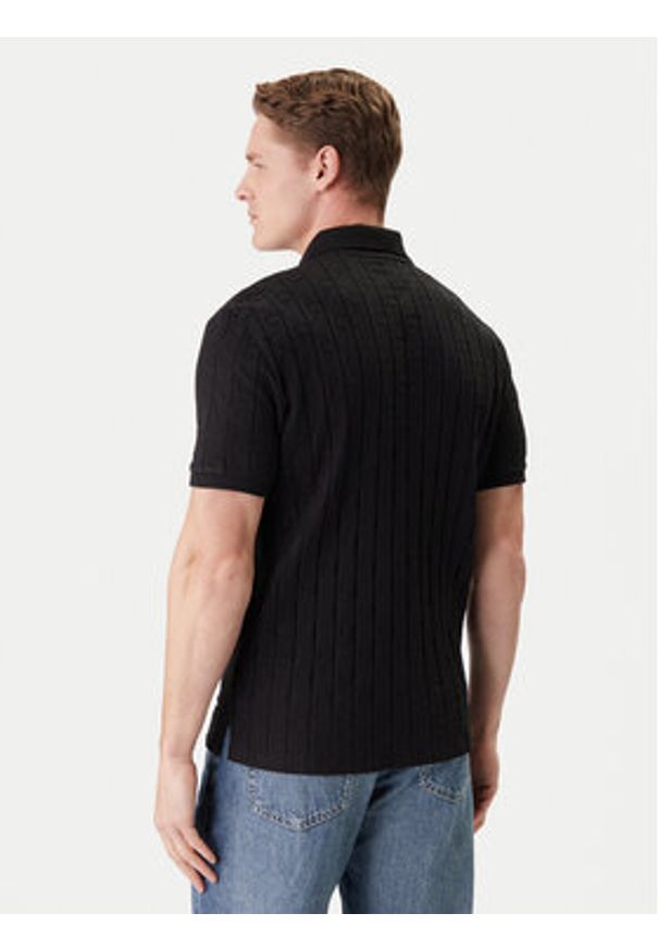 Calvin Klein Polo LV04LE203G Czarny Regular Fit. Typ kołnierza: polo. Kolor: czarny. Materiał: bawełna