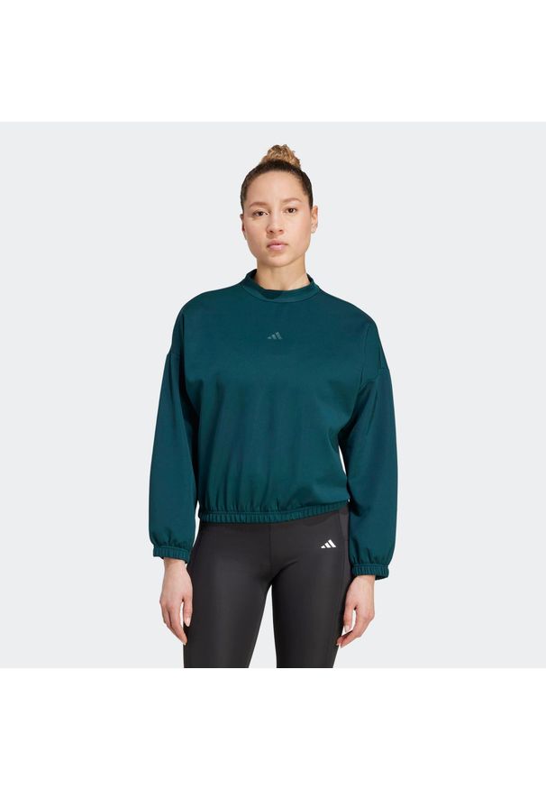 Adidas - Bluza fitness damska ADIDAS crop top. Kolor: zielony. Materiał: materiał. Sport: fitness