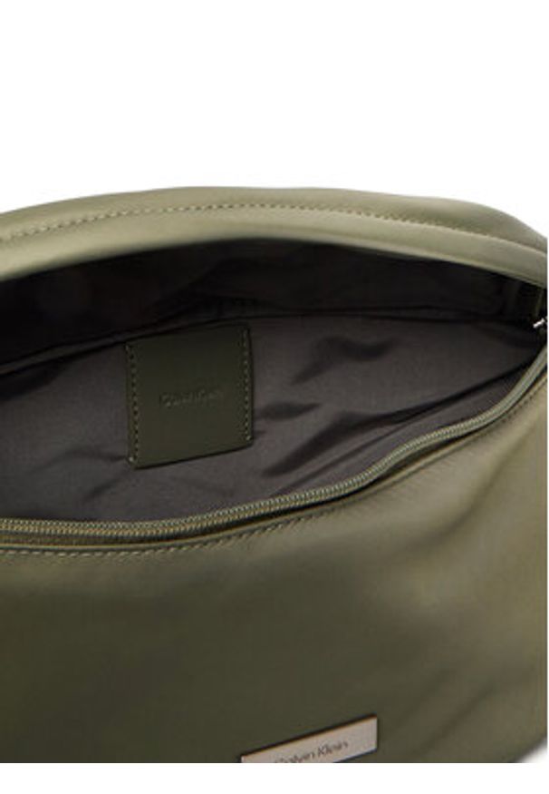 Calvin Klein Nerka Sleek Waistbag Sling LV04D3148G Zielony. Kolor: zielony. Materiał: skóra