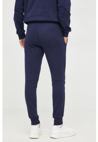 Lacoste spodnie dresowe męskie kolor granatowy gładkie XH9624-132. Kolor: niebieski. Materiał: dresówka. Wzór: gładki #3