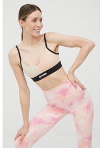 Rip Curl biustonosz sportowy Mirage Run Swim Surf kolor różowy gładki. Kolor: różowy. Materiał: skóra, materiał. Rodzaj stanika: wyciągane miseczki. Wzór: gładki. Sport: bieganie #3