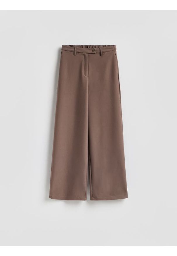 Reserved - Spodnie z szerokimi nogawkami - beżowy. Kolor: beżowy. Materiał: tkanina, wiskoza