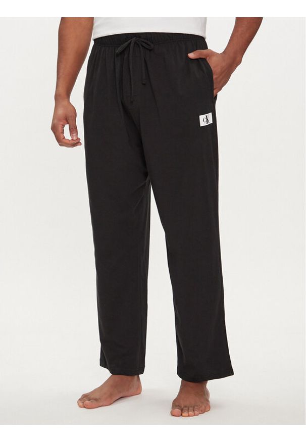 Calvin Klein Underwear Spodnie piżamowe 000NM2611E Czarny Regular Fit. Kolor: czarny. Materiał: bawełna