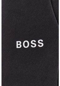 BOSS - Boss Spodnie męskie kolor czarny gładkie. Kolor: czarny. Materiał: dzianina, poliester, bawełna. Wzór: gładki