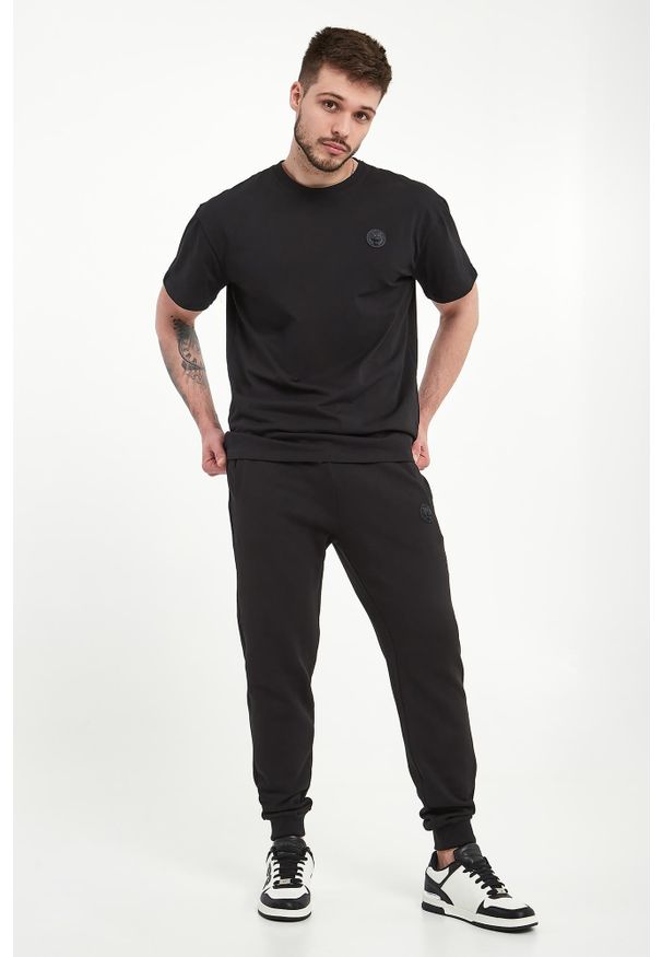 Plein Sport - Spodnie dresowe męskie PLEIN SPORT. Materiał: dresówka