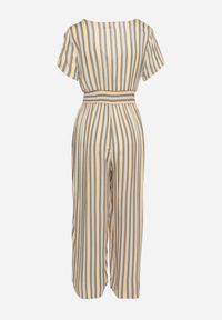 Born2be - Beżowy Wiskozowy Kombinezon z Guzikami przy Dekolcie i Elastyczną Gumką w Talii Tinaleias. Okazja: na co dzień, do pracy. Kolor: beżowy. Materiał: wiskoza. Długość: długie. Wzór: aplikacja. Styl: casual, klasyczny #6