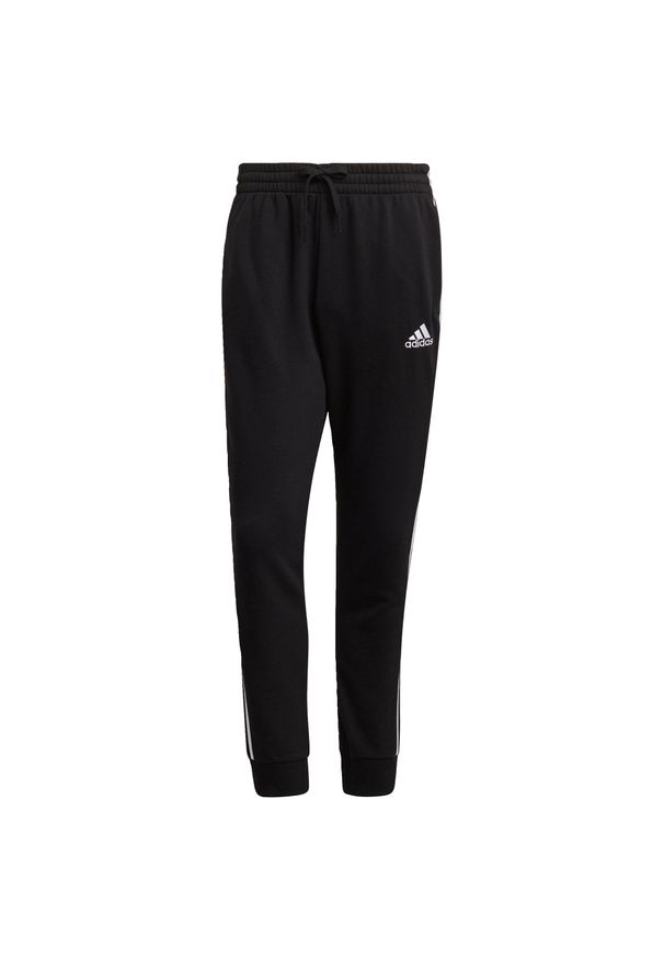 Adidas - Spodnie adidas Essentials French Terry Tapered Cuff 3-Bandes. Kolor: czarny, biały, wielokolorowy. Sport: joga i pilates