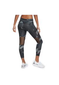 Spodnie do biegania damskie Nike Fast Tight 7/8 Runway CU3114. Materiał: materiał, poliester, skóra. Technologia: Dri-Fit (Nike). Wzór: nadruk #5
