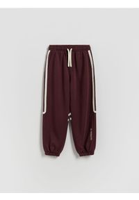 Reserved - Bawełniane spodnie - bordowy. Kolor: czerwony. Materiał: bawełna #1