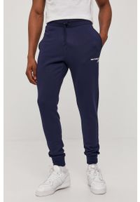 New Balance Spodnie MP03904PGM męskie kolor granatowy gładkie. Kolor: niebieski. Wzór: gładki #1