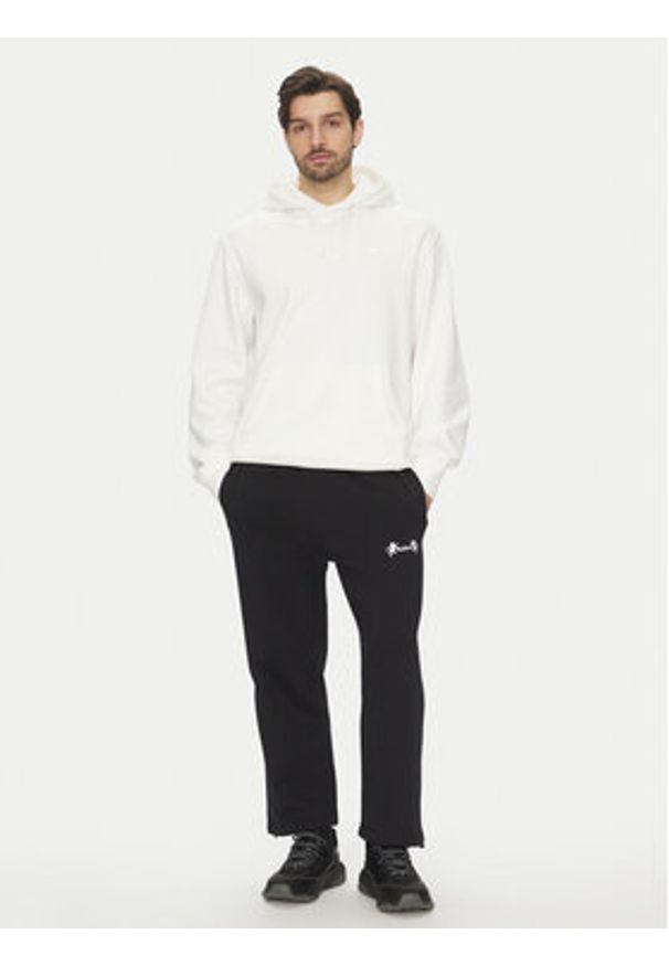 Nike Spodnie dresowe FB7127 Czarny Standard Fit. Kolor: czarny. Materiał: bawełna