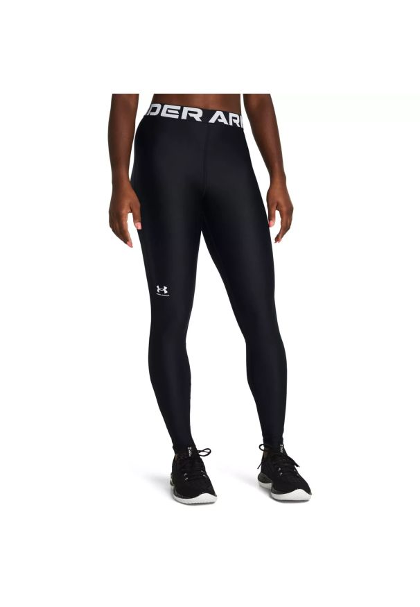 Under Armour UA HG LEGGING Legginsy damskie. Kolor: czarny. Materiał: tkanina, materiał, skóra. Styl: klasyczny, sportowy