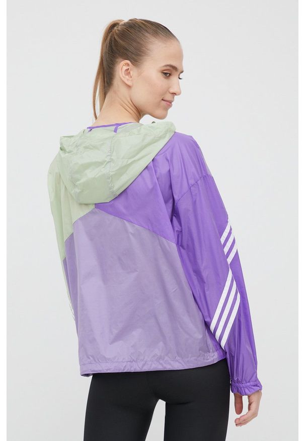 adidas Performance wiatrówka Back to Sport H48581 kolor fioletowy przejściowa oversize. Typ kołnierza: kaptur. Kolor: fioletowy. Materiał: materiał. Długość: krótkie. Styl: sportowy