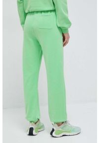 Champion spodnie dresowe kolor zielony gładkie. Kolor: zielony. Materiał: dresówka. Wzór: gładki #2