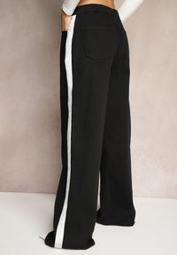 Renee - Czarne Jeansy High Waist z Szeroką Nogawką Gumką w Pasie i Lampasami Helvila. Okazja: na co dzień. Stan: podwyższony. Kolor: czarny. Styl: sportowy, elegancki, casual #4