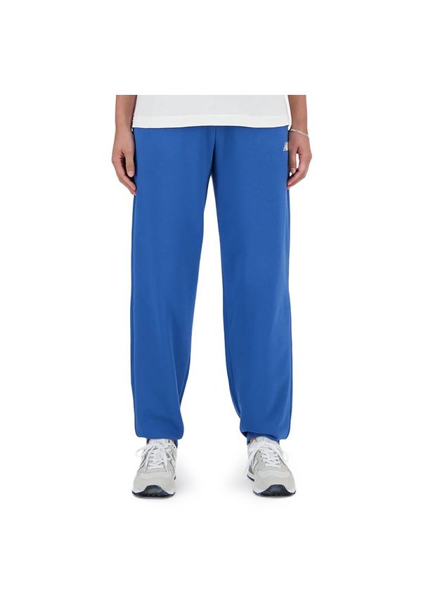 Spodnie New Balance WP41500BEU - niebieskie. Kolor: niebieski. Materiał: bawełna, dresówka, poliester