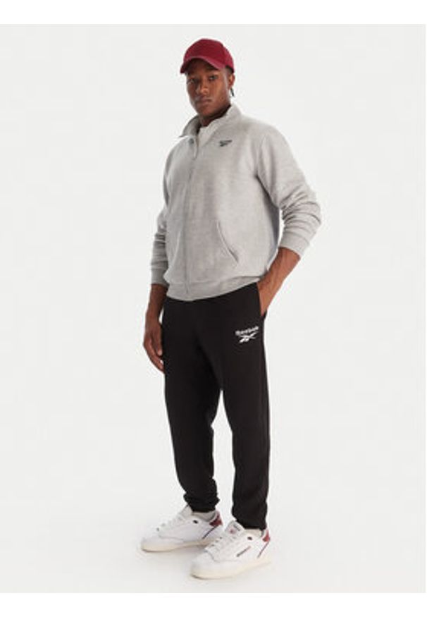 Reebok Spodnie dresowe Winslow RK25140CCM Czarny Regular Fit. Kolor: czarny. Materiał: bawełna, syntetyk