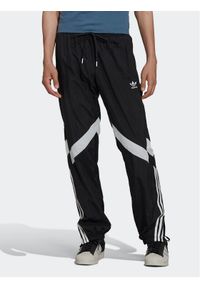 Adidas - adidas Spodnie dresowe Rekive HK7325 Czarny Regular Fit. Kolor: czarny. Materiał: dresówka, syntetyk