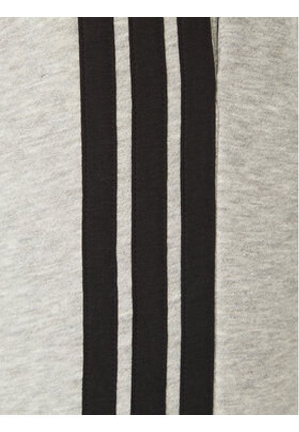 Adidas - adidas Spodnie dresowe Essentials 3-Stripes JE6318 Szary Regular Fit. Kolor: szary. Materiał: syntetyk, bawełna