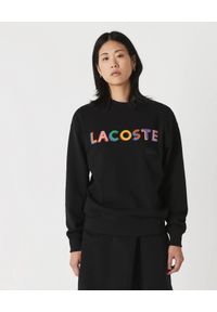 Lacoste - LACOSTE - Czarna bluza z logo 3D Unisex Fit. Kolor: czarny. Materiał: bawełna, prążkowany. Długość rękawa: długi rękaw. Długość: długie. Wzór: haft, kolorowy
