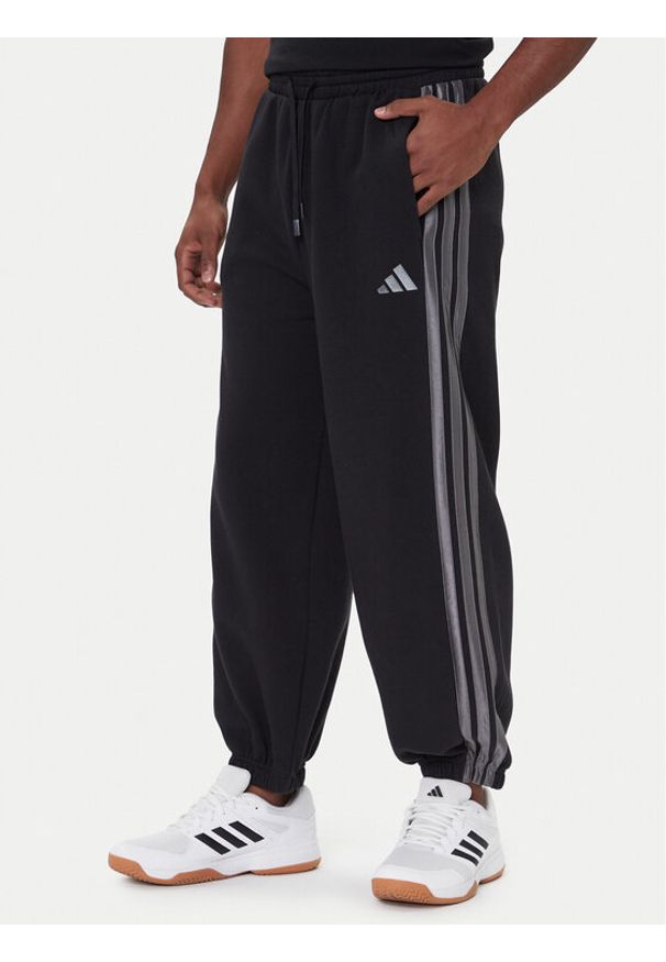 Adidas - adidas Spodnie dresowe Ess JM1703 Czarny Regular Fit. Kolor: czarny. Materiał: bawełna