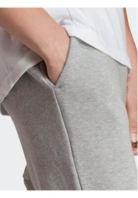 Adidas - adidas Spodnie dresowe Essentials HA4345 Szary Regular Fit. Kolor: szary. Materiał: bawełna #6