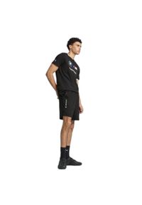 Szorty Puma BMW MMS MT7+ Woven 7". Kolor: czarny. Długość: krótkie. Sezon: lato
