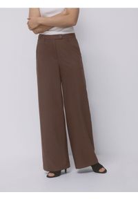 Reserved - Spodnie z szerokimi nogawkami - beżowy. Kolor: beżowy. Materiał: wiskoza, tkanina