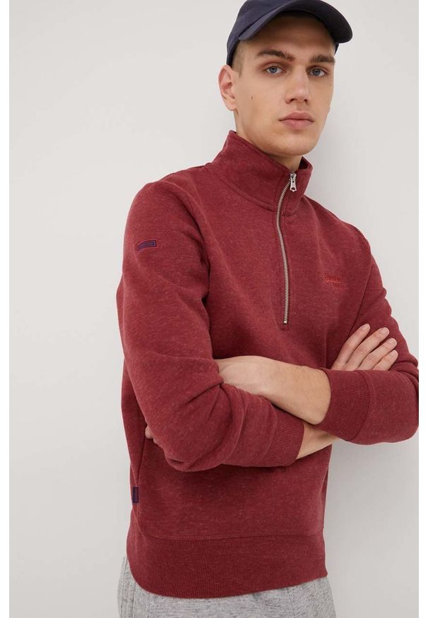 Superdry bluza męska kolor bordowy melanżowa. Kolor: czerwony. Materiał: dzianina, bawełna. Długość: krótkie. Wzór: melanż