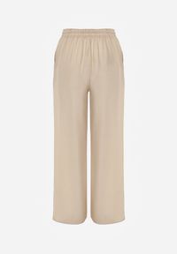 Renee - Beżowe Szerokie Spodnie z Wiskozy i Gumką w Pasie Abyga. Okazja: na co dzień. Kolor: beżowy. Materiał: wiskoza. Styl: casual #8