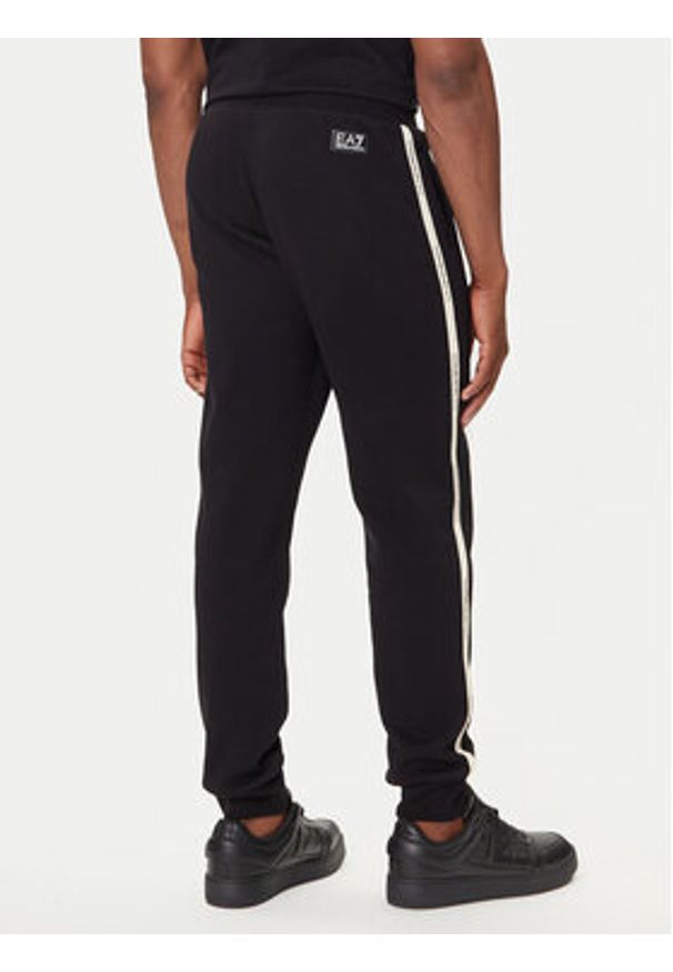 EA7 Emporio Armani Spodnie dresowe 7M000974 AF10377 UC001 Czarny Regular Fit. Kolor: czarny. Materiał: bawełna