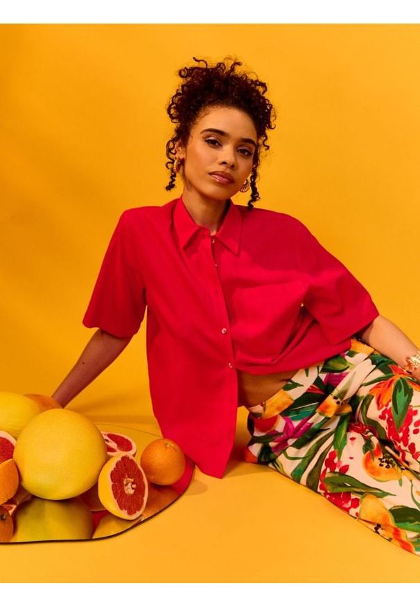 Sinsay - Wiskozowe spodnie wide leg z nadrukiem kwiatowym - wielobarwny. Materiał: wiskoza. Wzór: kwiaty, nadruk