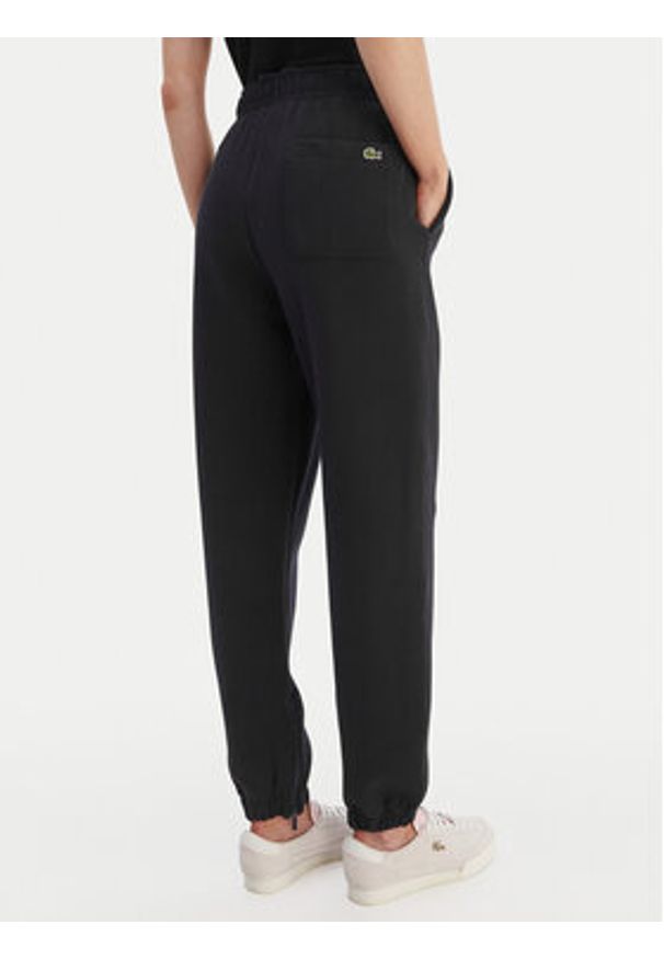 Lacoste Spodnie dresowe XF5244 Granatowy Regular Fit. Kolor: niebieski. Materiał: bawełna