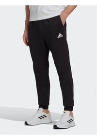 Adidas - adidas Spodnie dresowe Essentials Fleece Regular Tapered Joggers HL2236 Czarny Regular Fit. Kolor: czarny. Materiał: bawełna