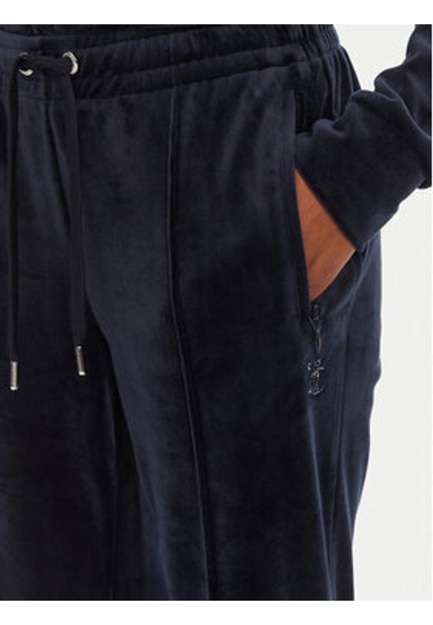 Juicy Couture Spodnie dresowe Tina JCAPW045 Granatowy Regular Fit. Kolor: niebieski. Materiał: syntetyk