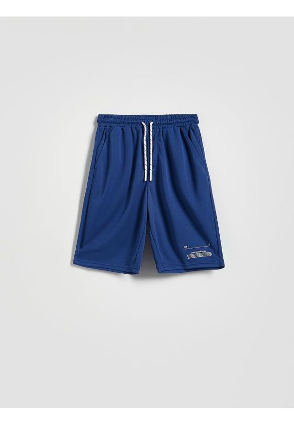 Reserved - Sportowe szorty - granatowy. Kolor: niebieski. Materiał: dzianina. Styl: sportowy