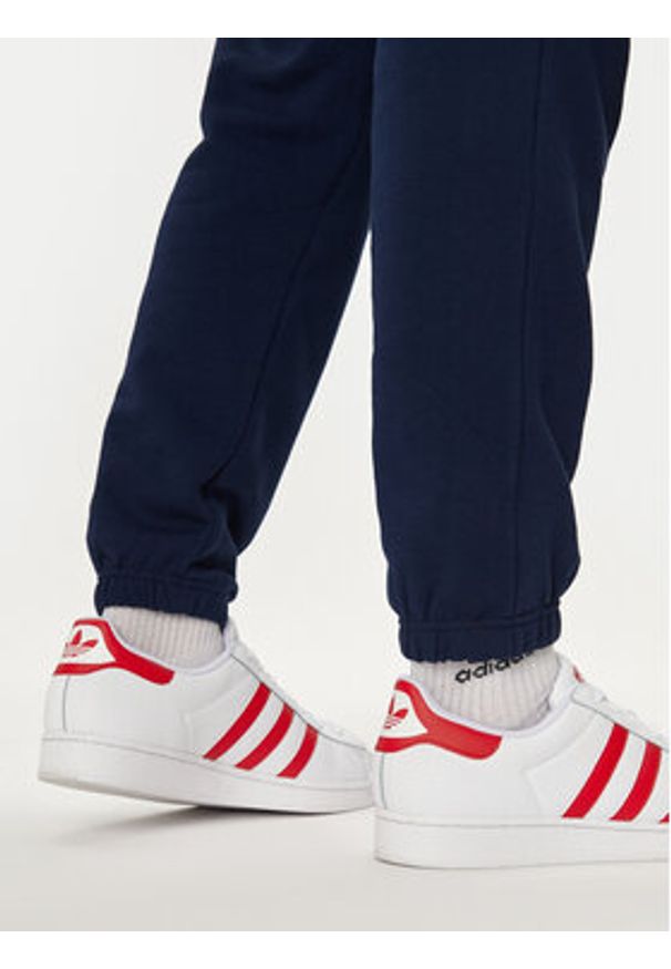 Adidas - adidas Spodnie dresowe Trefoil Essentials IX7689 Granatowy Regular Fit. Kolor: niebieski. Materiał: bawełna