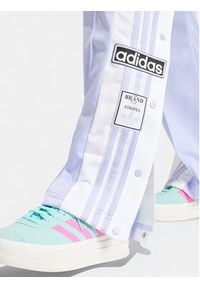 Adidas - adidas Spodnie dresowe Adibreak IP0625 Fioletowy Regular Fit. Kolor: fioletowy. Materiał: syntetyk #6