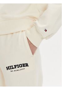 TOMMY HILFIGER - Tommy Hilfiger Bluza Monotype Flock WW0WW41236 Écru Relaxed Fit. Materiał: bawełna
