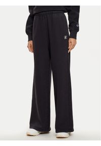 Champion Spodnie dresowe 117661 Czarny Wide Leg. Kolor: czarny. Materiał: bawełna #1