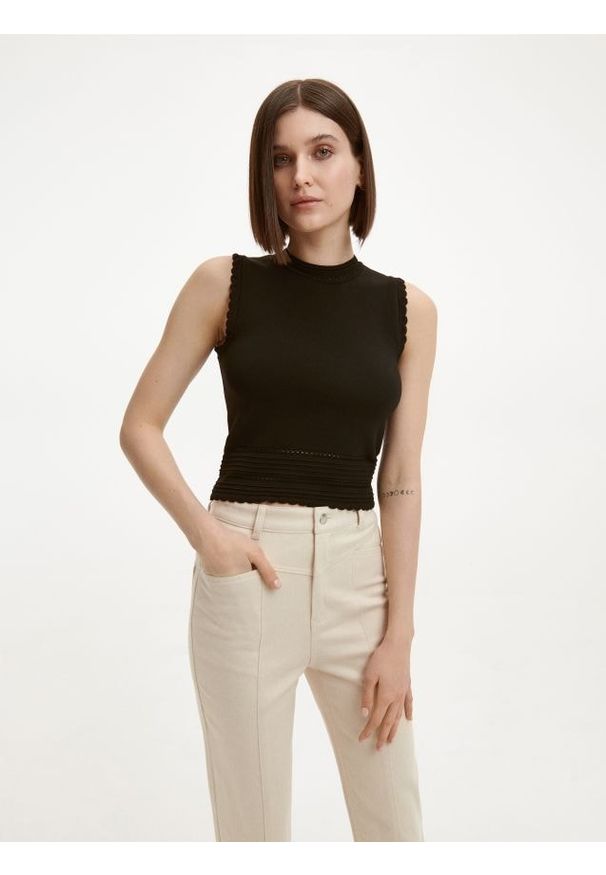 Reserved - Dzianinowa bluzka - czarny. Kolor: czarny. Materiał: dzianina. Wzór: gładki