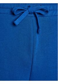 outhorn - Outhorn Spodnie dresowe OTHAW23TTROM442 Niebieski Regular Fit. Kolor: niebieski. Materiał: bawełna #2