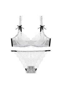 Intica - Komplet bielizny z koronki z delikatnymi wiązaniami Aftina. Kolor: biały. Materiał: koronka. Wzór: koronka