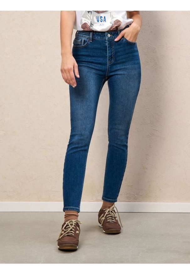 Sinsay - Spodnie jeansowe skinny - granatowy. Kolor: niebieski