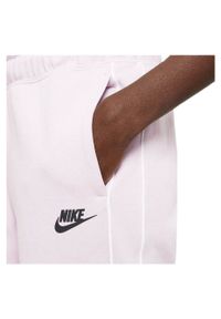 Spodnie damskie Nike Sportswear Fleece Jogger CZ8340. Materiał: materiał, polar, dzianina, skóra, prążkowany. Wzór: gładki #5