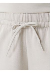 Adidas - adidas Spodnie dresowe Essentials Small Logo Feel Cozy JC5922 Beżowy Regular Fit. Kolor: beżowy. Materiał: syntetyk, bawełna #2